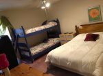 2nd bedroom with qull and bunk set